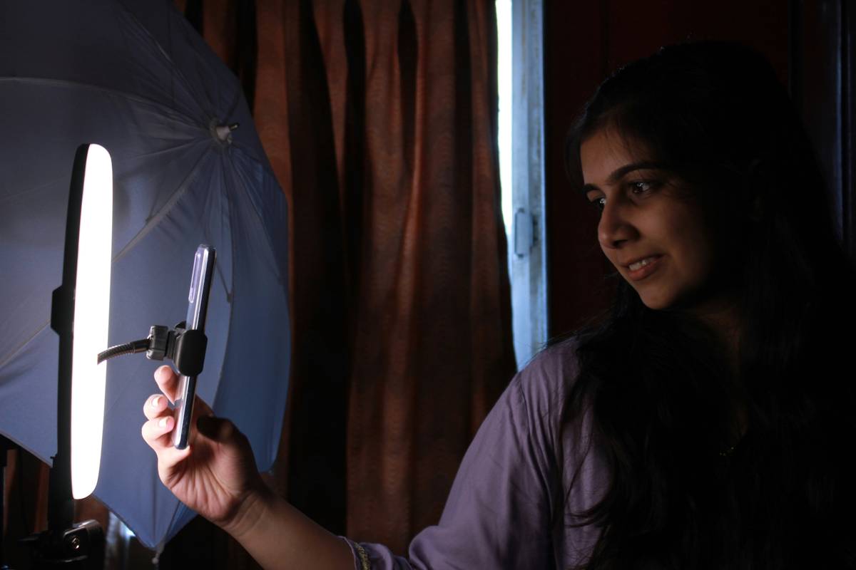 Three-point streaming lighting setup demonstrating how to light yourself for streaming with labeled key fill and backlight positions